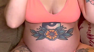 Pregnant Slut Fingers Her Ass