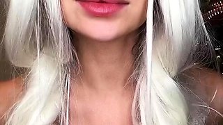 Bodacious young blonde flashing her big tits on webcam