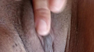 Wet brunette masturbating