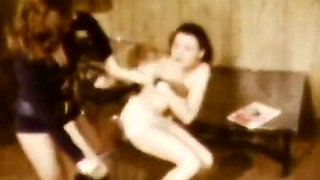 Retro Mistress Trains Submissives with Whips and Vintage Dildos
