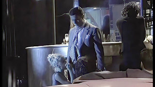 2 Sluts Share an Italian Cock in a Nightclub Among the People