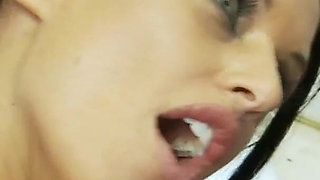 Tattooed MILF gets a hard dick in a gloryhole