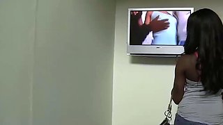 Busty black girl with hefty boobies looks away from