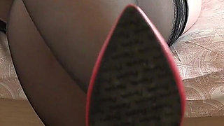 Foot Fetish. a Chubby MILF with Big Tits Takes off Her Stockings.