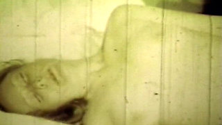 Worn Sepia Loop Captures Curly Retro Couple in Raw Bedroom Passion