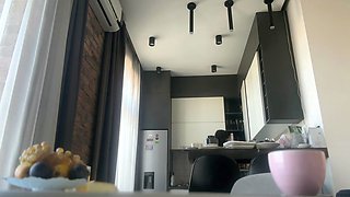 Sexy fit brunette does housework without panties.