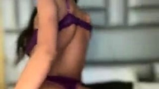 Busty babe playing with her big boobs