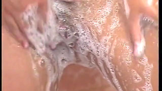 Hairy MILF slut masturbates under shower