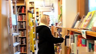 Sensuous blonde teen flashing her perky tits in public