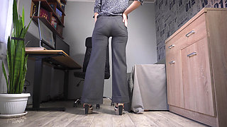 Sexy Coworker in Wide Leg Trousers Teases Ass