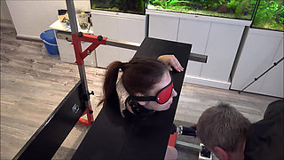 Slave Defenseless in Pillory Driven to Orgasm on Sybian