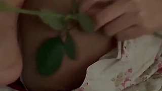 A Slender-waisted Woman Is Masturbating on the Bed