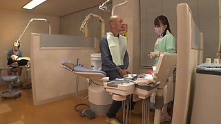 Elegant Dental Hygienist Leaning Close