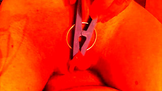 clothespin on the clitoris