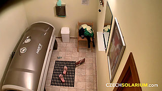 Czech Solarium 152: Silicone Brunette Bares All in Solarium