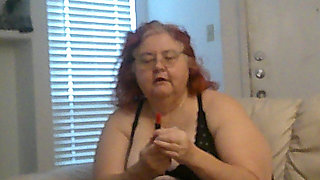 Mature BBW Redhead Nurse Vicki Talks to You as She Makes a Lipstick Applying Video for You!