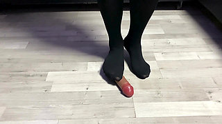 Sexy Dominatrix in Nylon Pantyhose Is Trampling Your Cock