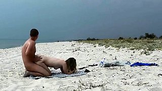 Amateur Nudist MILF Has Doggy-Style Fun at the Beach