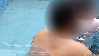 A Hot Couple's Risky Fun in the Swimming Pool.