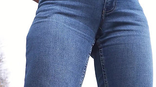 MILF Teasing Her Big Cameltoe in Blue Jeans Outdoors
