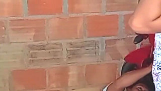 Mechanic Measures the Oil of the Neighbor's Motorcycle