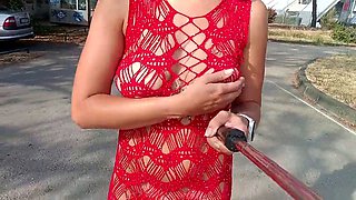 Lace sundress flaunts big tits and pussy in the wild