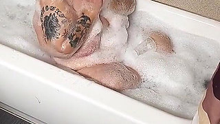 Naughty Bubbler Getting Soapy Masterbating in the Tub Her Pussy She Rubs