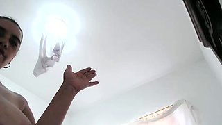 Busty curly brunette with big boobs fucks on couch