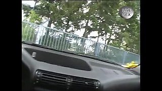 Cute blonde teen masturbating with fingers in car backseat
