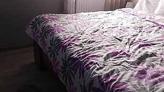 A friend's room has a hard orgasm on the bed