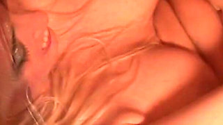 Young brunette licks blonde mature's cunt then fucks her with a strap on