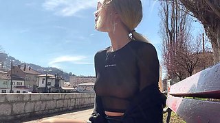 Public city walk in see-through top. Flashing tits to for