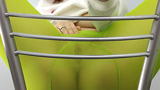Redhead Teen Feeling Horny in Green Tights on Chair