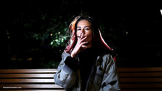 Sexy Russian Beauty Smoking Cigarette by Seaside
