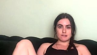 Horny brunette girl strips and plays with her pussy