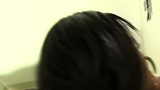 Busty dark-hued woman loves hard-core glory hole