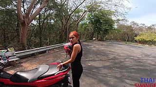 Asian hottie with fiery locks indulges in a steamy Thai encounter